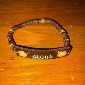 Brown Aloha Handmade Bracelet with Yellow Floral Accents from Natural Materials